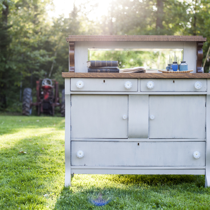 milk paint dresser with vintage glass knobs