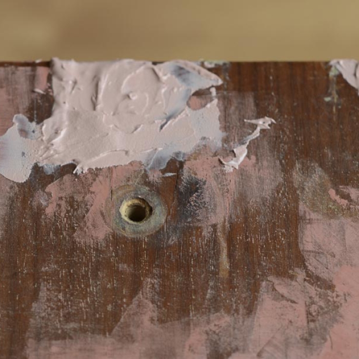 dresser_applying_bondo