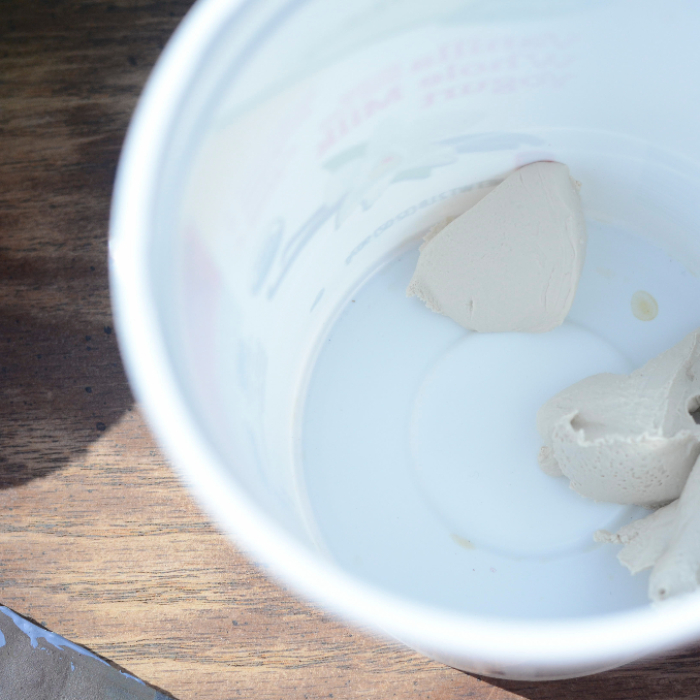 How to use wood filler to fill in wood grain so that the grain doesn't show through after the finish is applied.  Want to know how to do this?  Click through to the blog post!